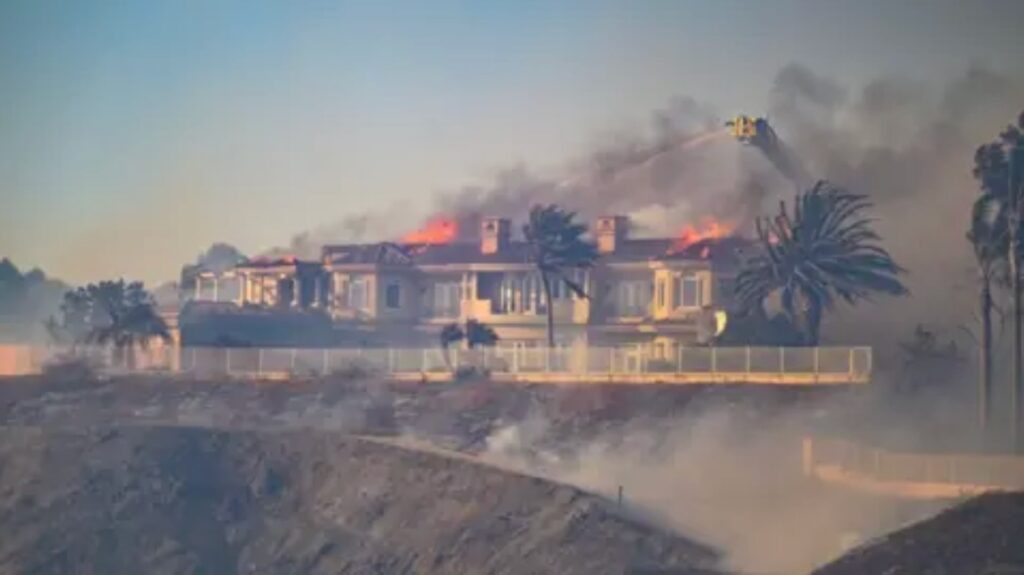 Luxury home on fire in California as wildfire spreads, exposing FAIR Plan insurance gaps
